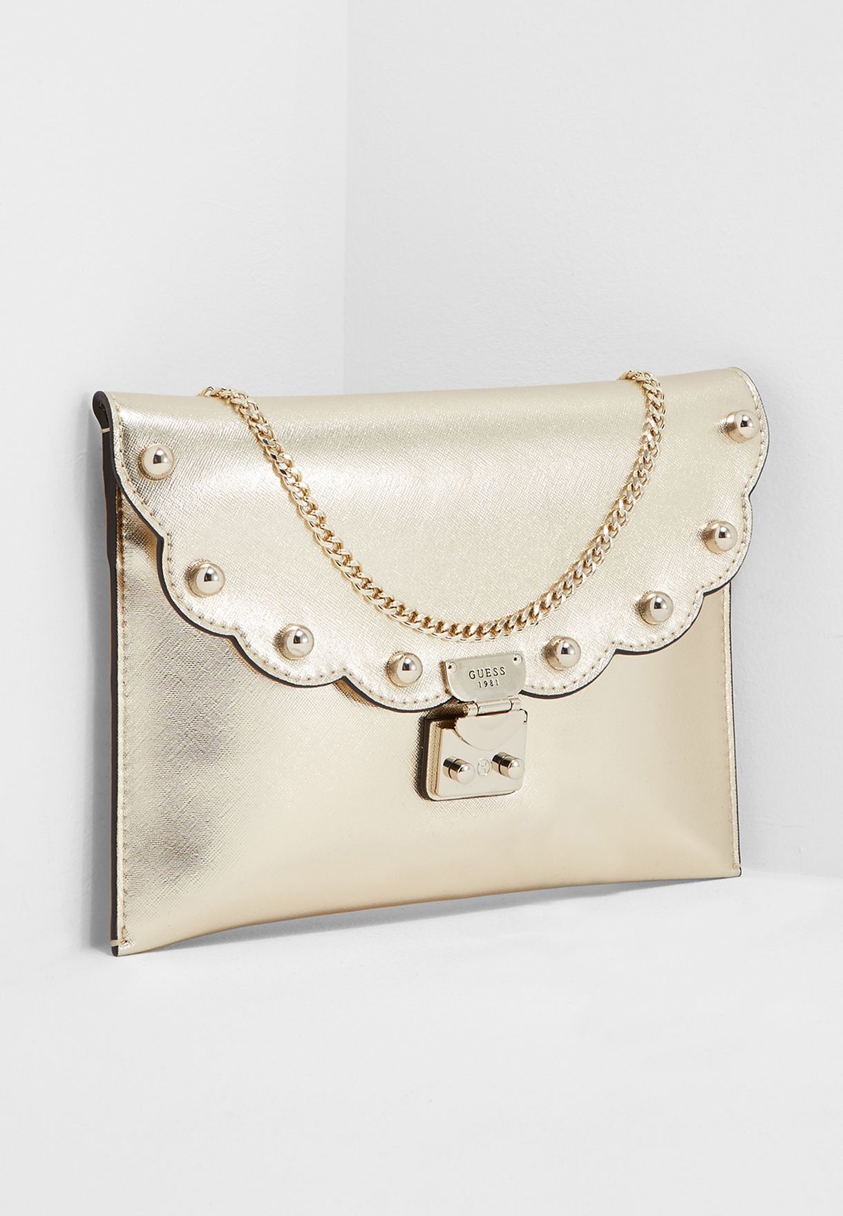 guess gold clutch bag