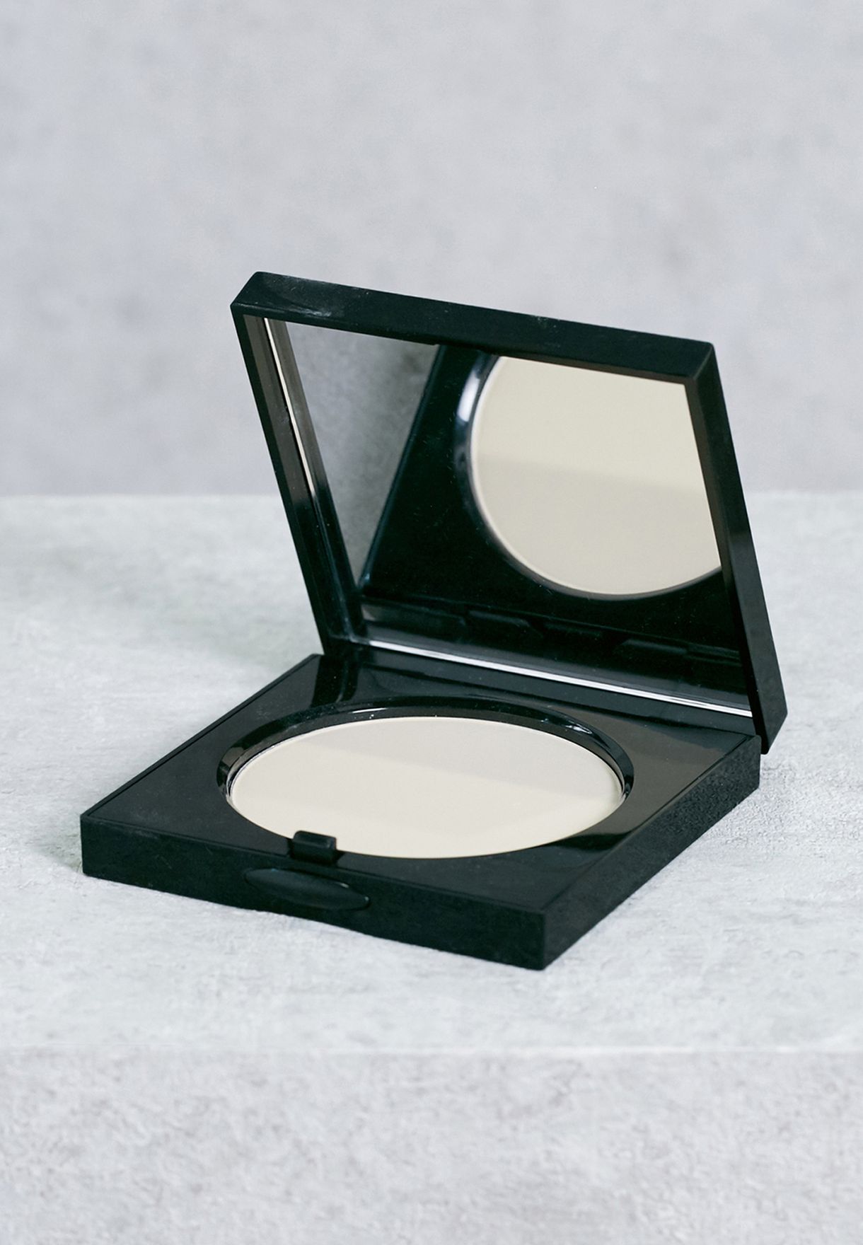 pale pressed powder