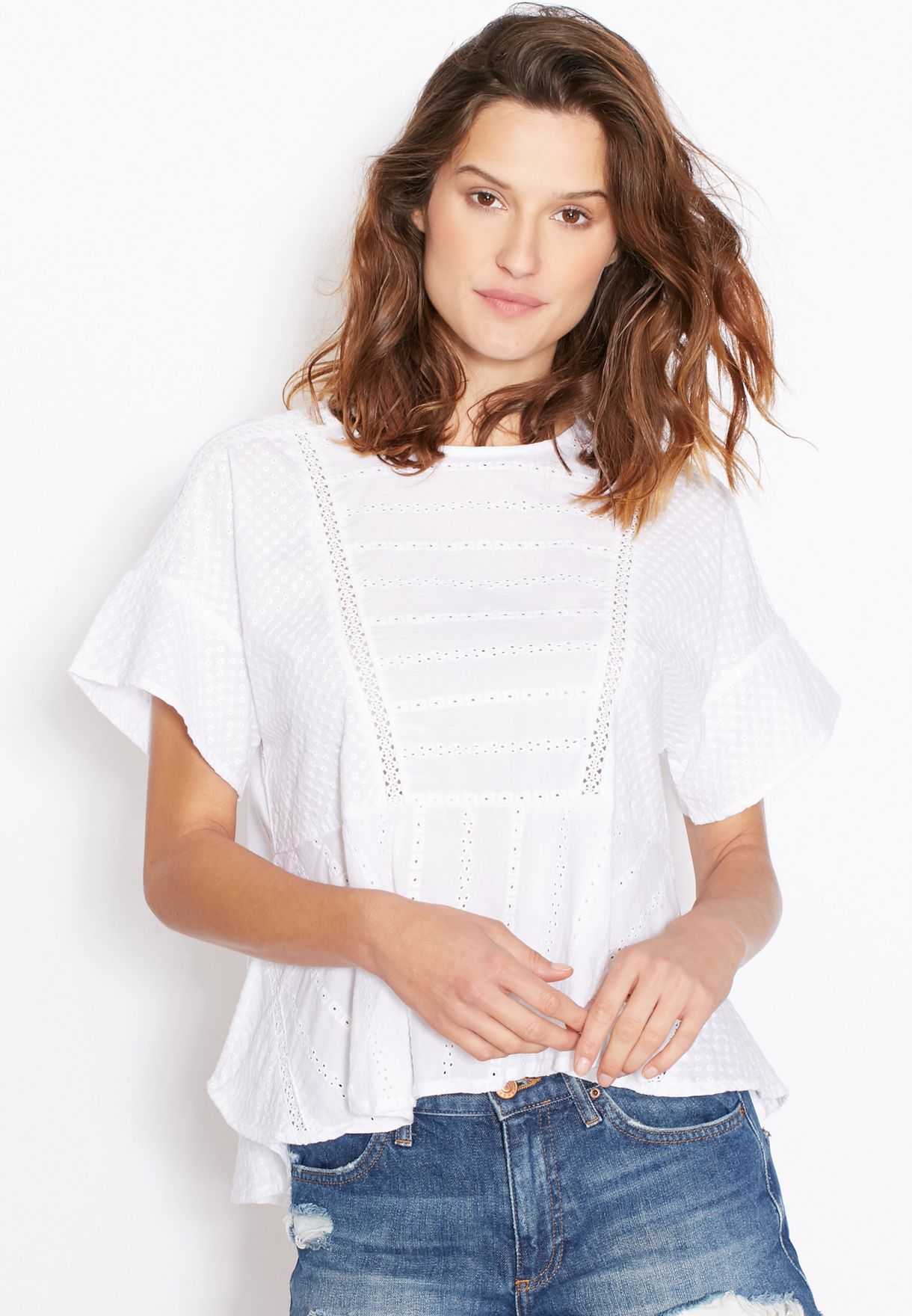 white broderie peplum top