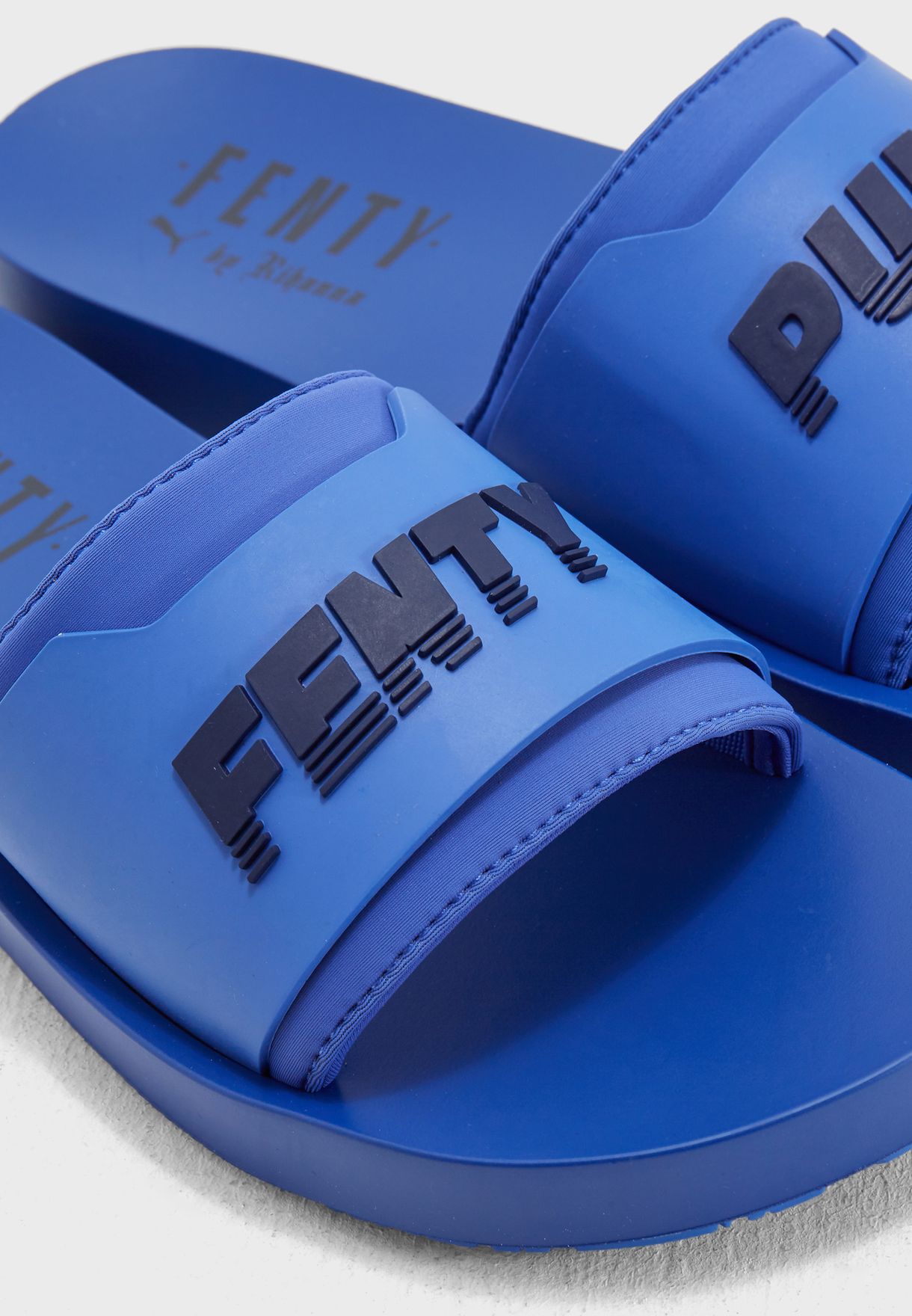 blue fenty puma slides