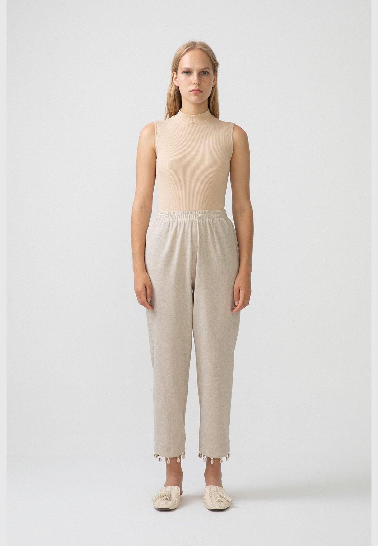 LINEN TROUSERS WITH COWRIE