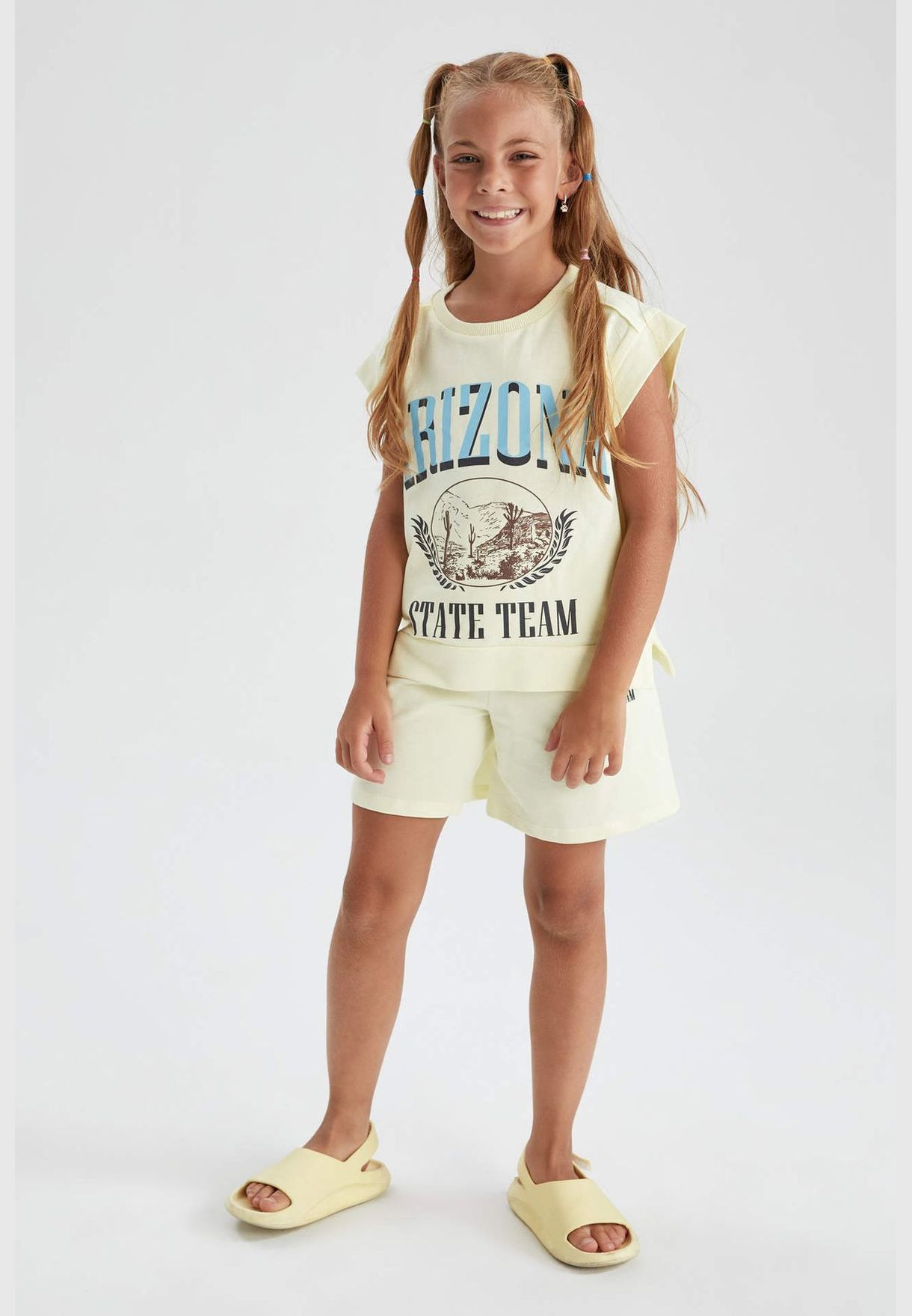 Text Printed Sleeveless T-Shirt And Shorts Set