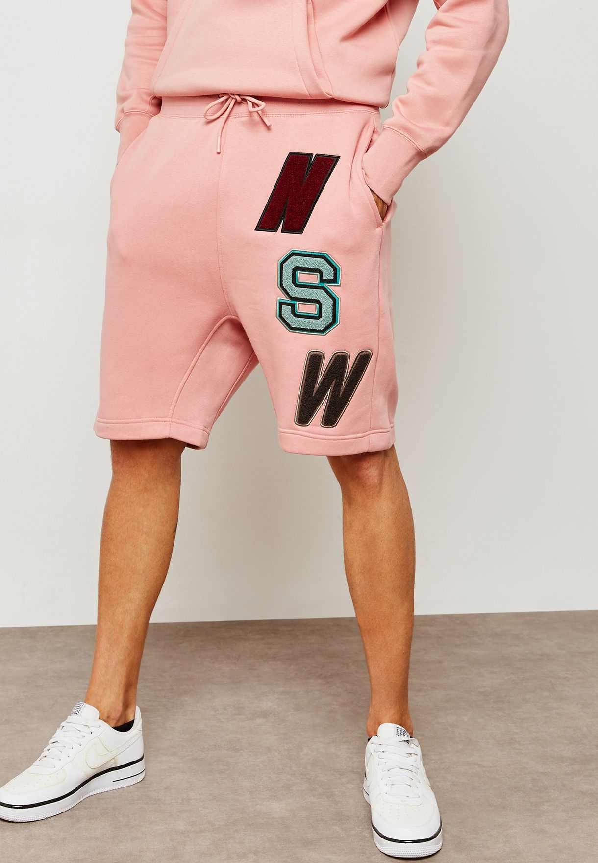 pink nike shorts fleece