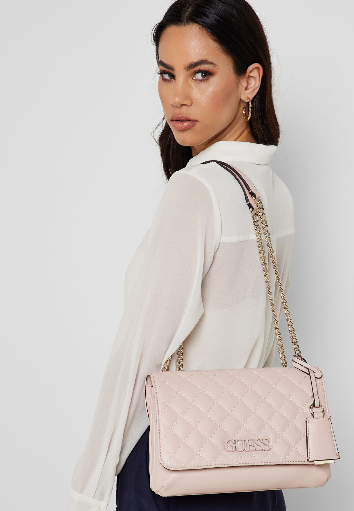 Buy Guess pink Elliana Convertible Flap Over Crossbody for Women in ...