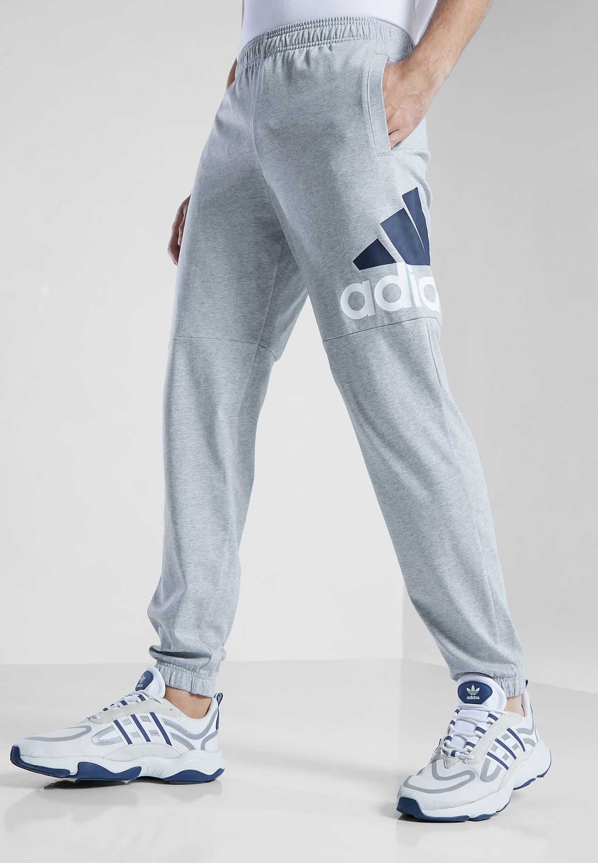 Buy adidas grey Essential Logo Sweatpants for Men in MENA, Worldwide |  BK7409