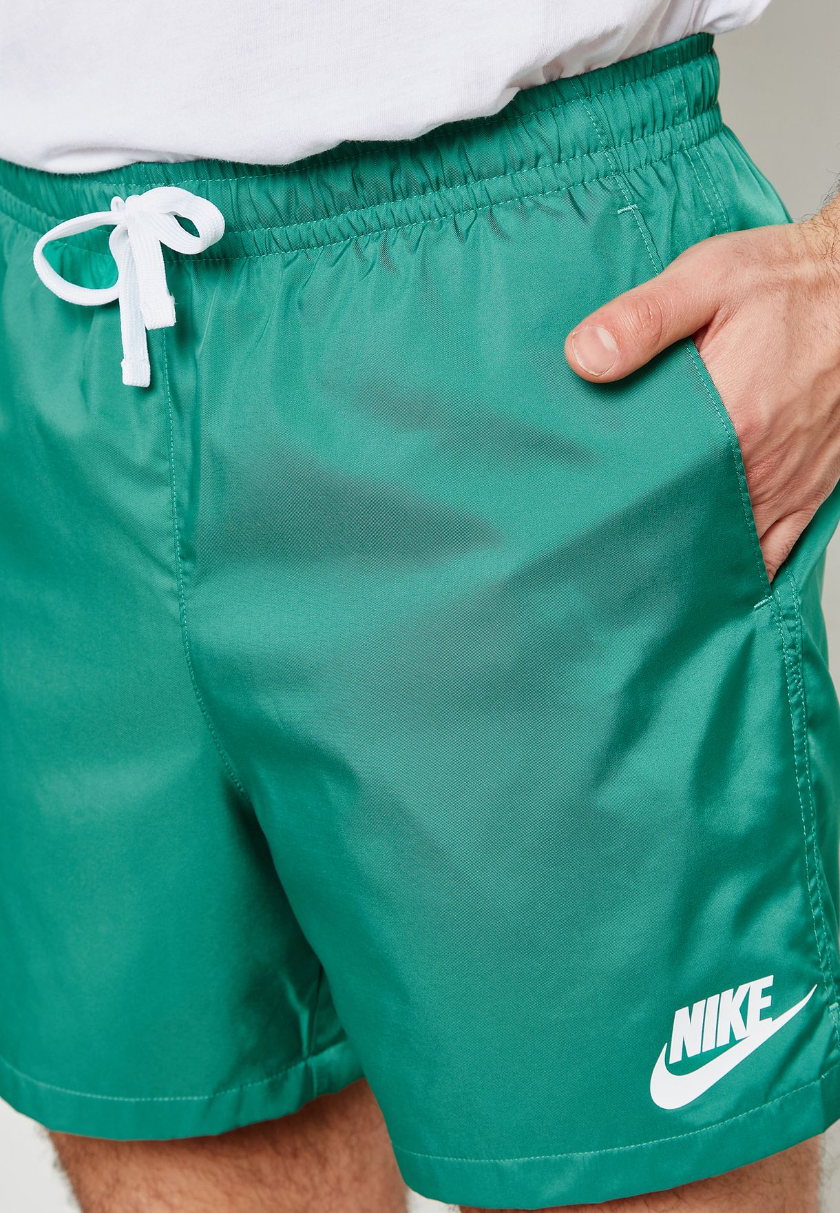 Buy > nike woven flow shorts green > in stock