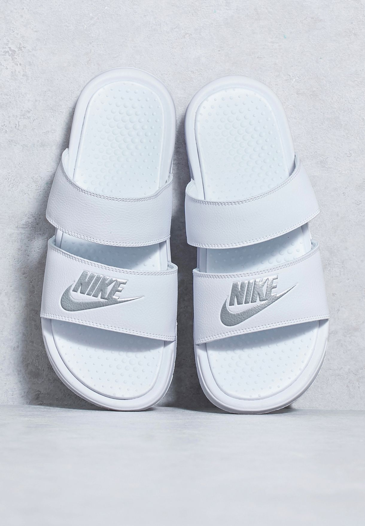 Buy Nike white Benassi Duo Ultra Slide 