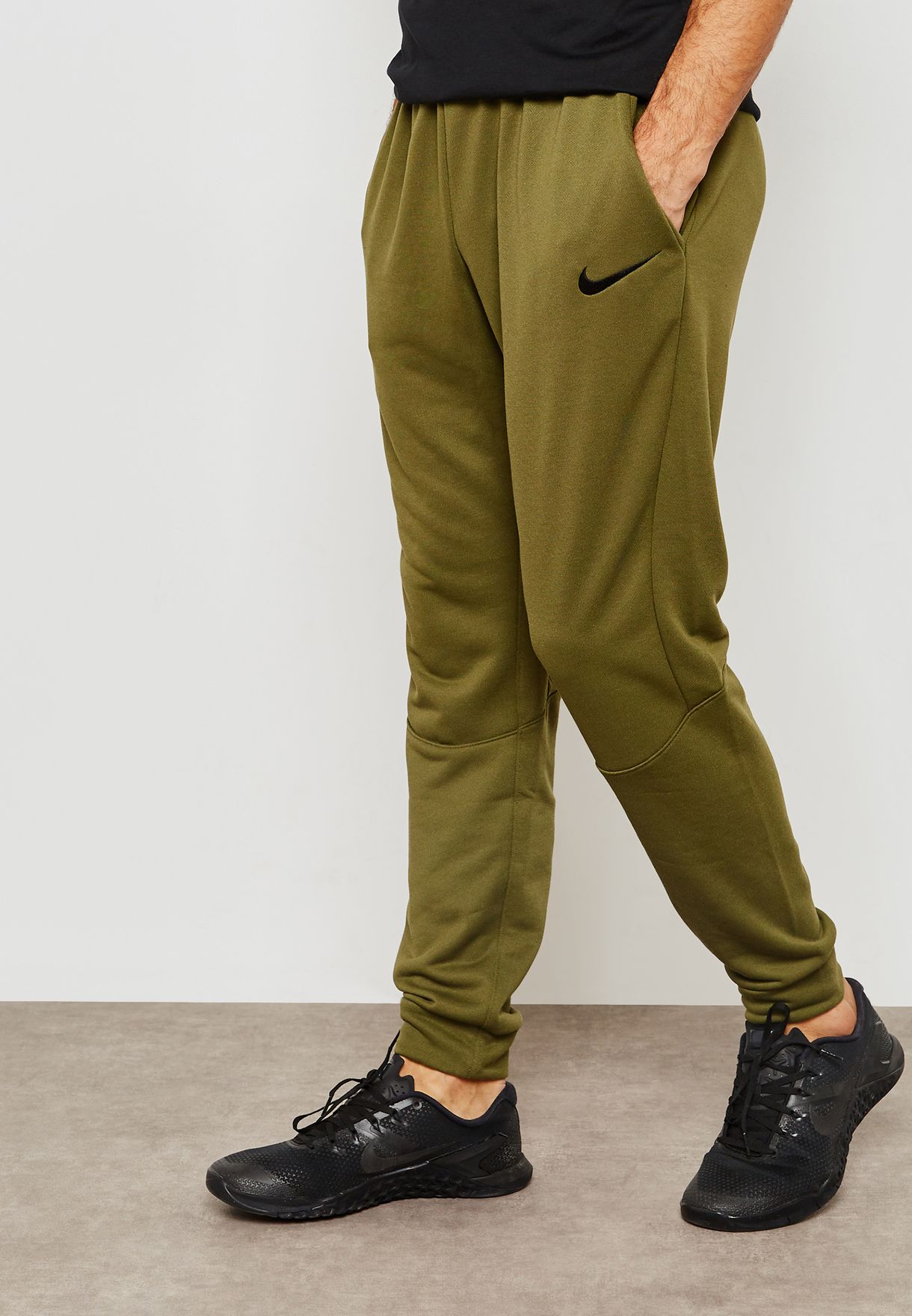 Buy Nike green Dri-FIT Taper Sweatpants 