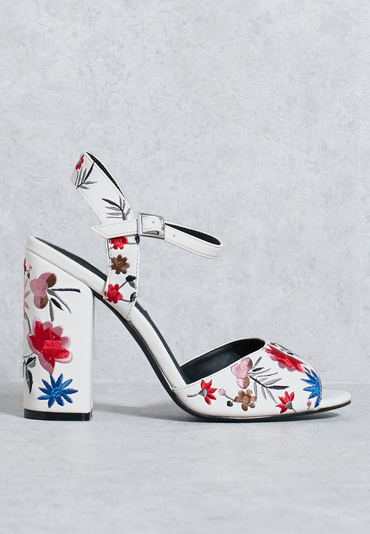 white embroidered heels