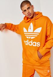 adidas originals oversized trefoil logo hoodie in orange