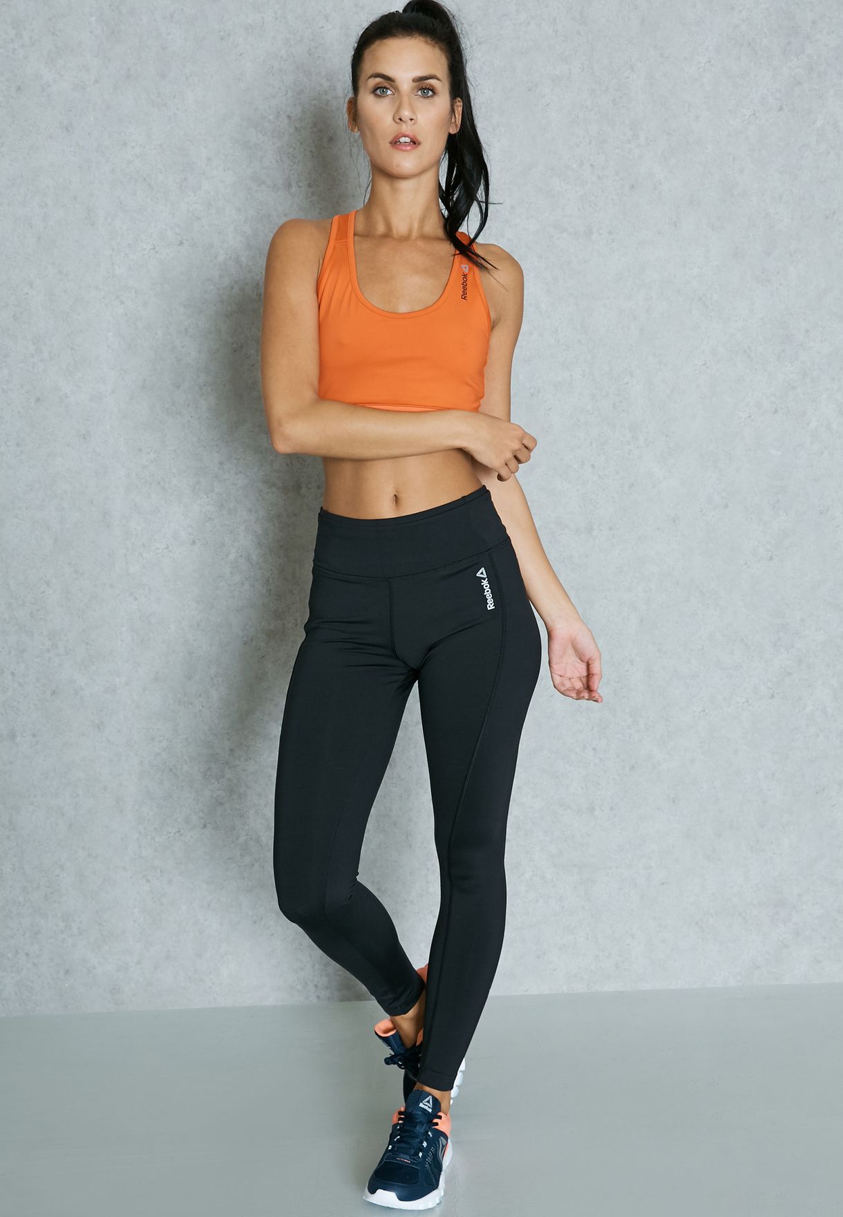 Gran cantidad de Oferta Acercarse Buy Reebok orange Workout Essential Bra for Women in MENA, Worldwide