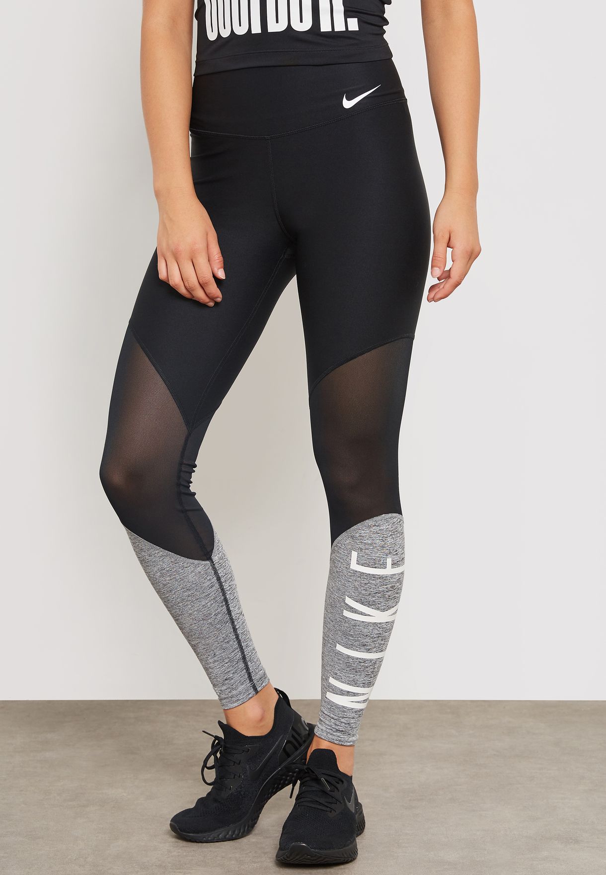 Nike Training leggings with mesh inserts in black