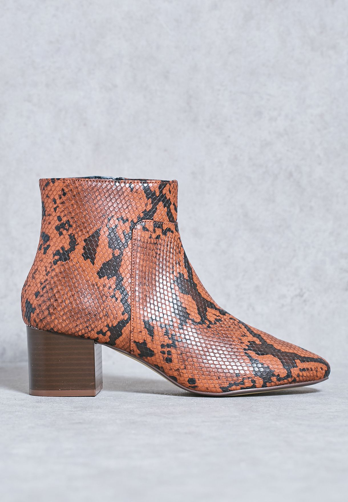 orange snake print boots