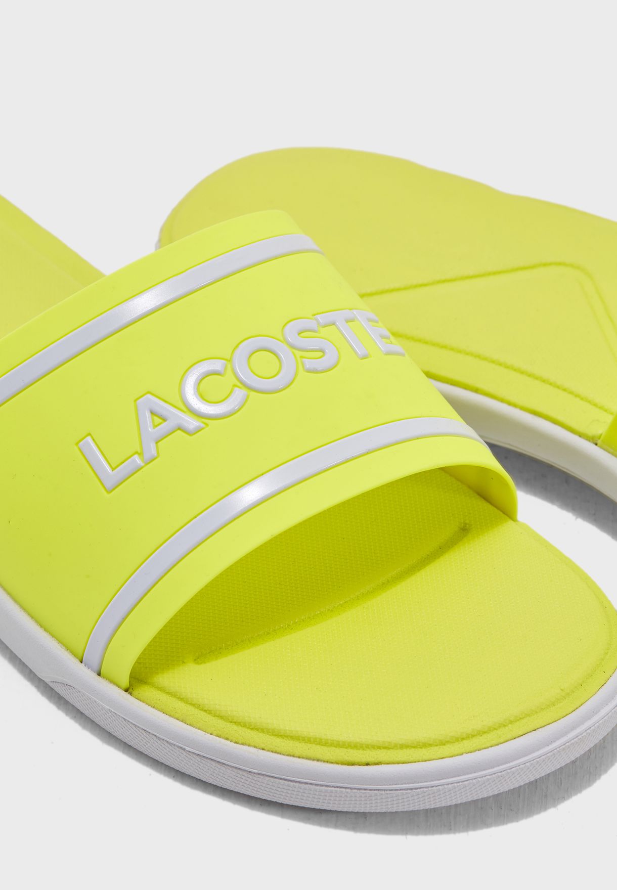 lacoste yellow slides