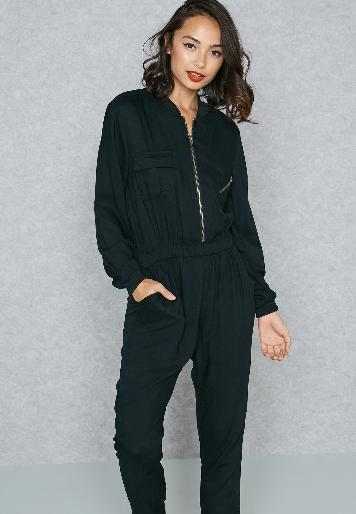 black jumpsuit with zip at front