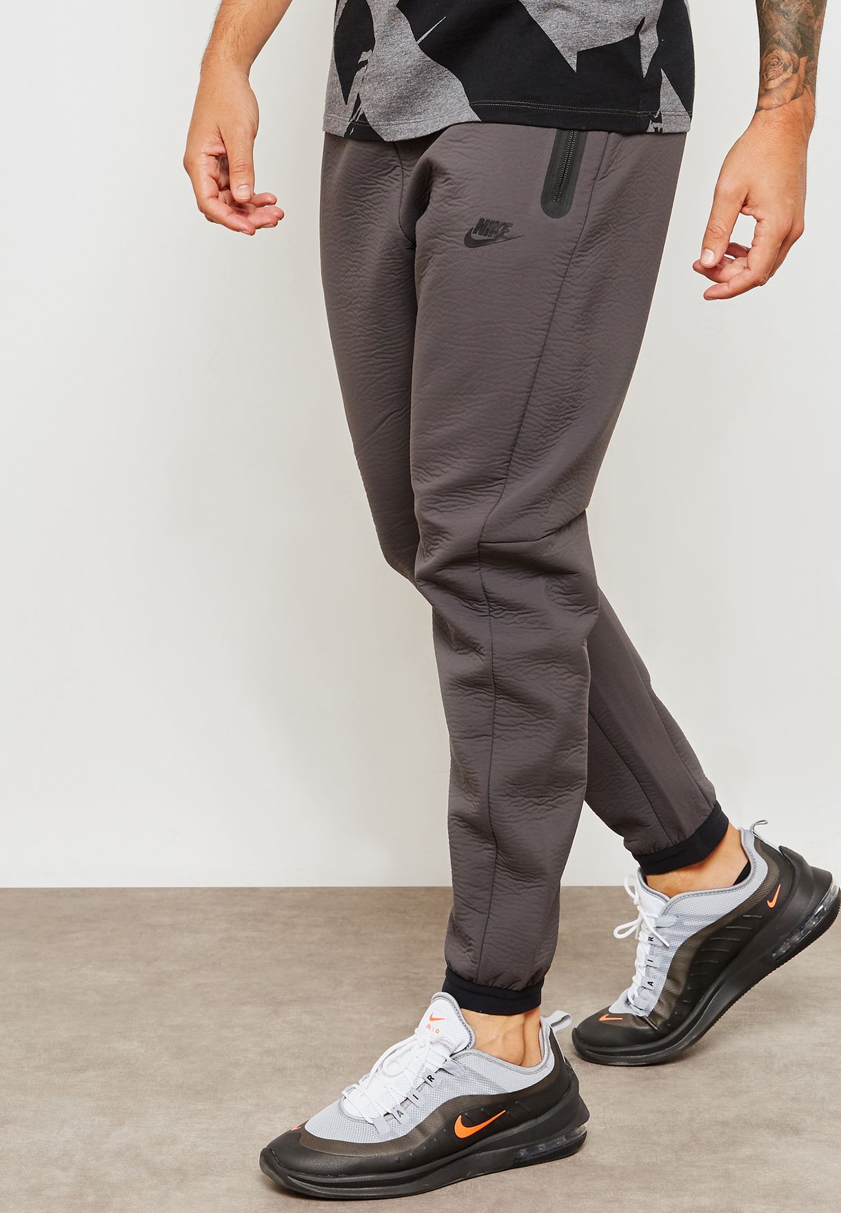 Buy Nike grey Tech Sweatpants for Men 