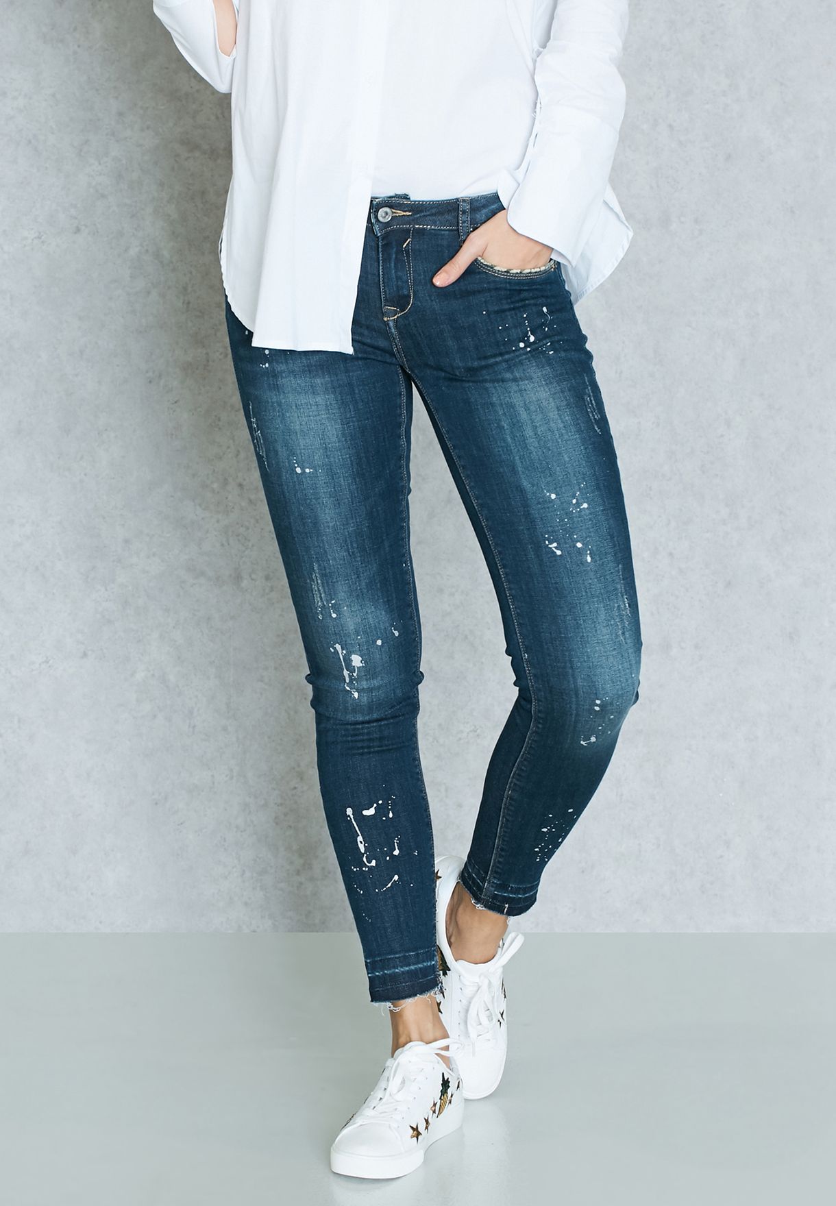 jeans with paint splatter women's