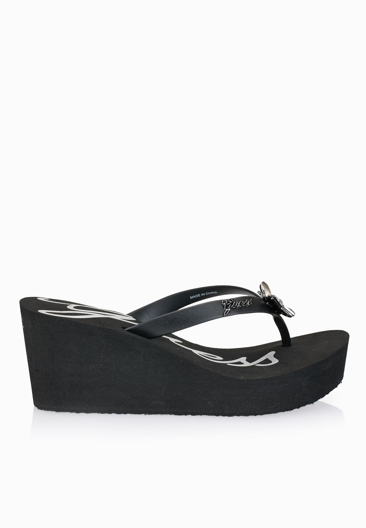 guess black wedge flip flops