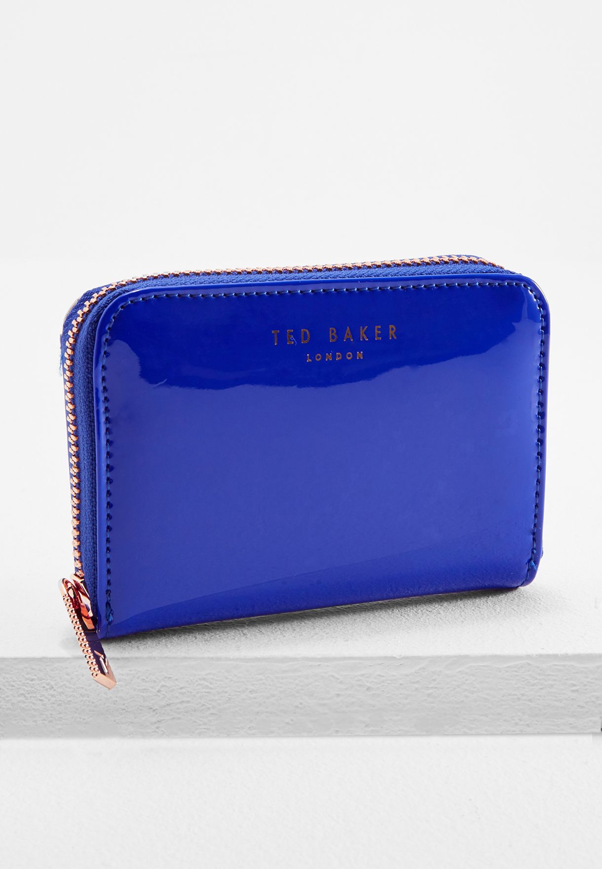 ted baker blue patent purse