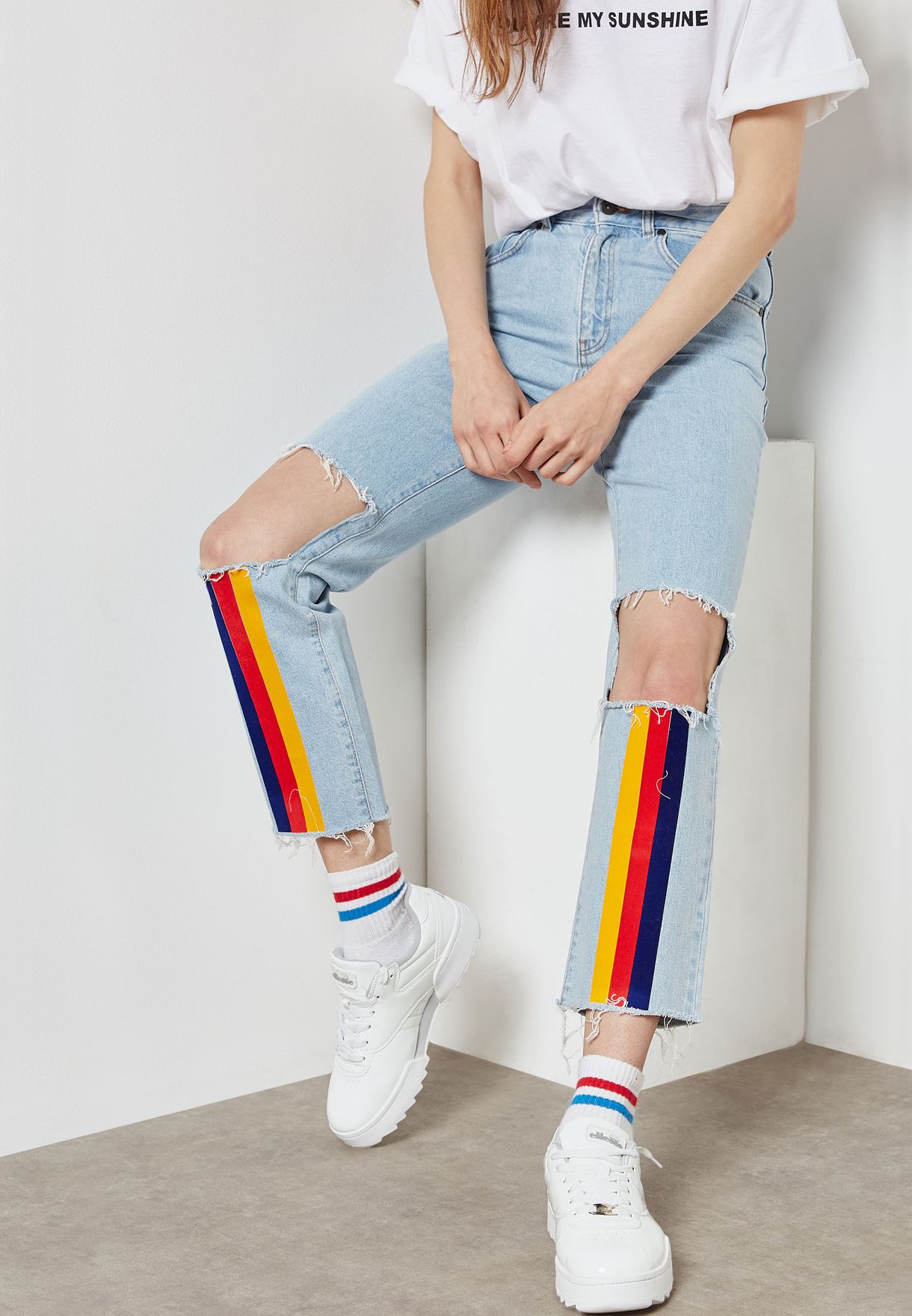 ripped striped jeans