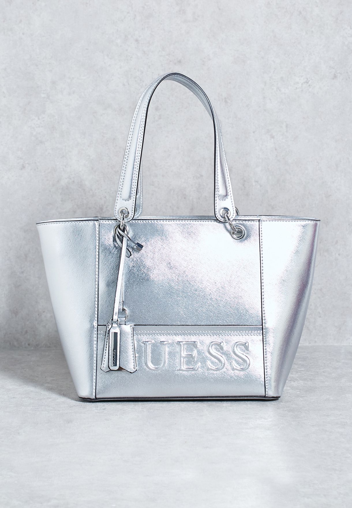 guess silver tote bag