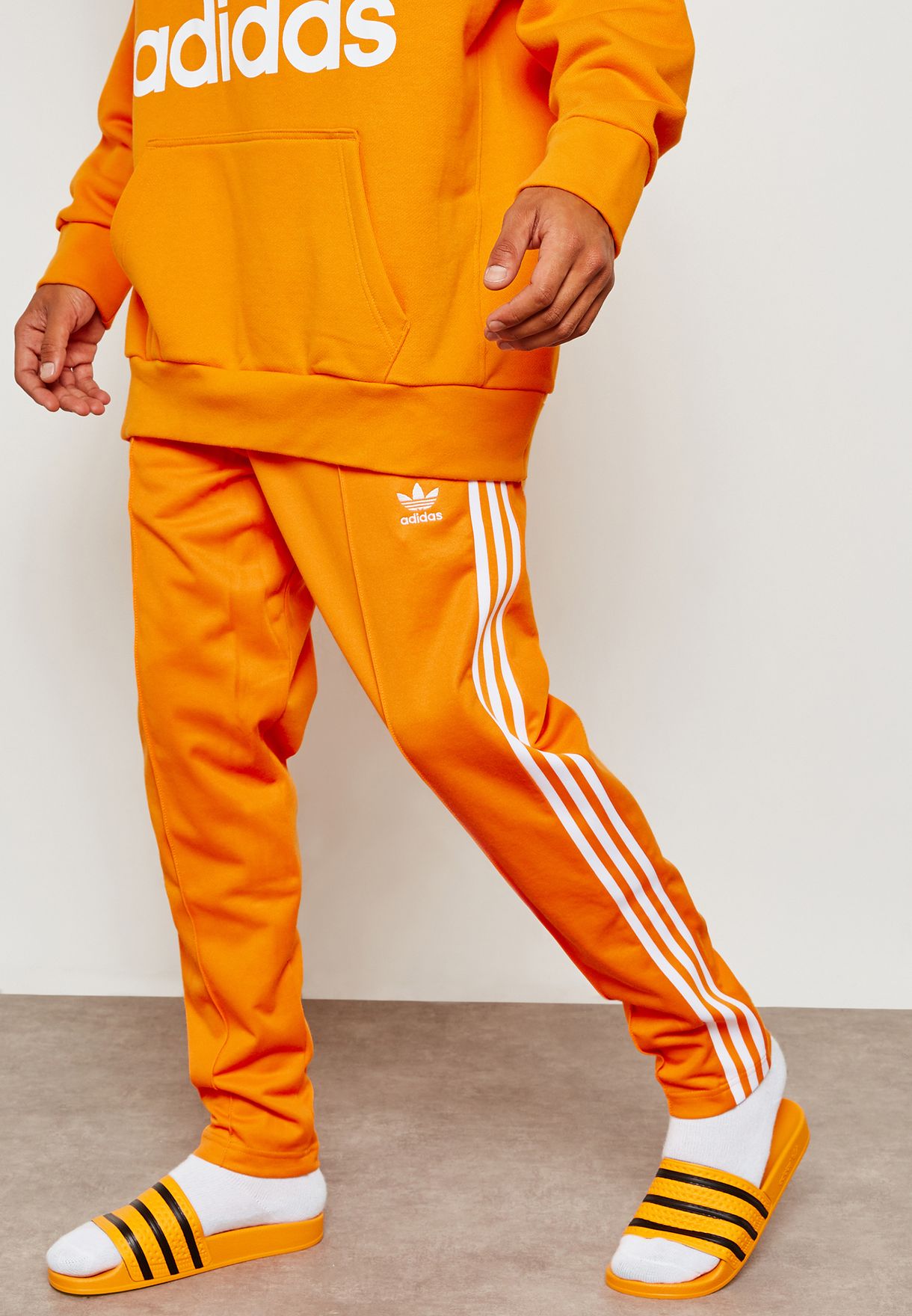 adidas beckenbauer orange pants