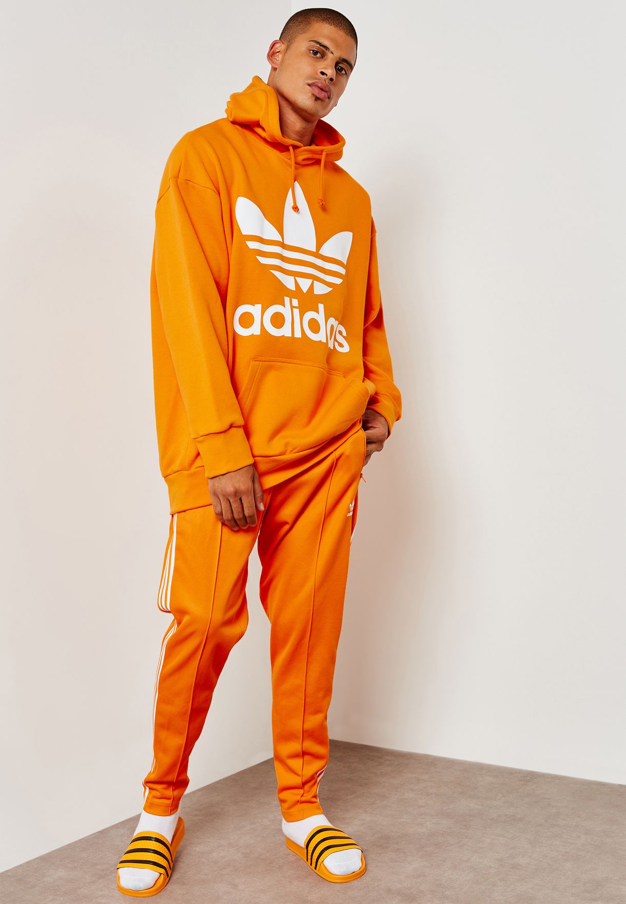 orange adidas sweatpants