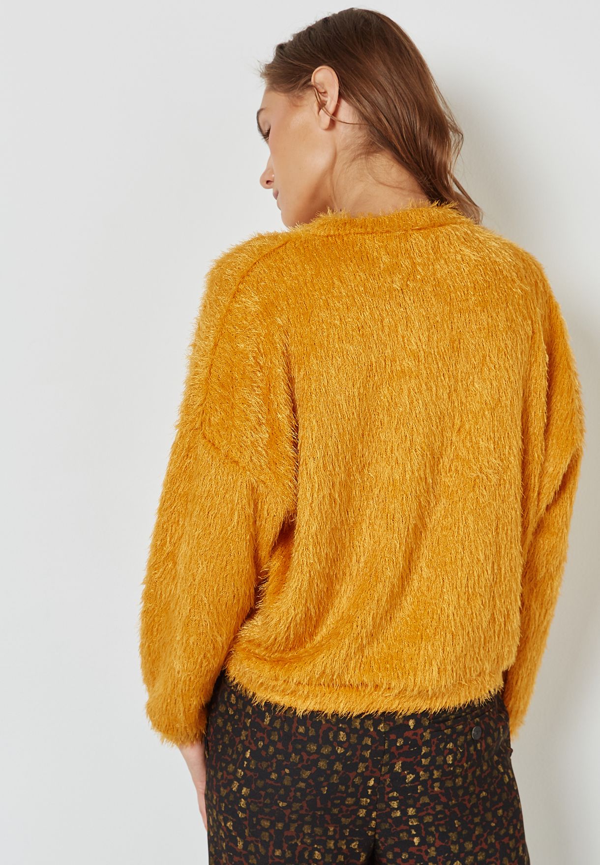 fluffy yellow sweater