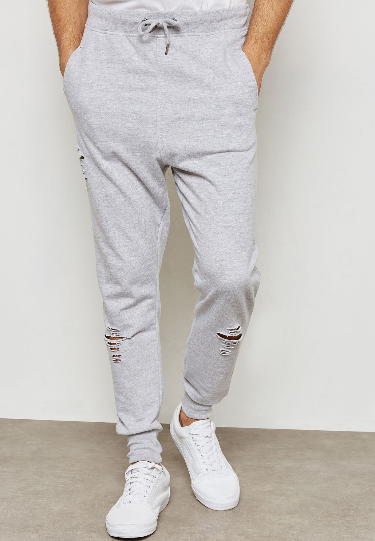 ripped grey joggers