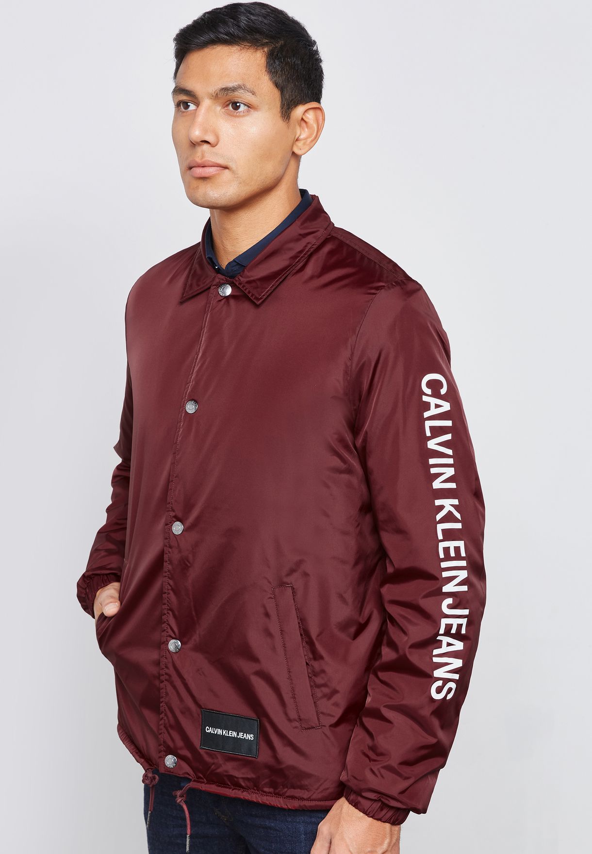 Buy Calvin Klein Jeans burgundy Institutional Coach Jacket for Men in MENA,  Worldwide