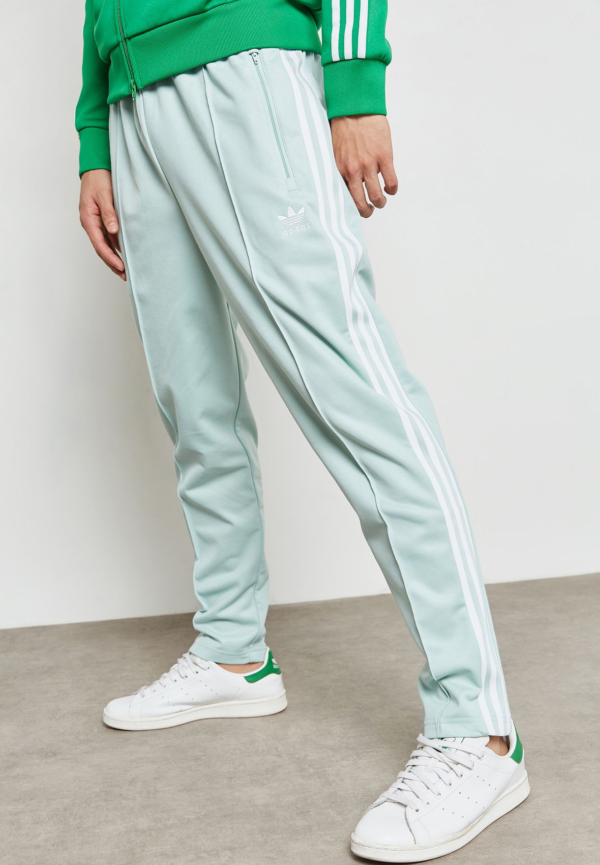 mint green adidas pants