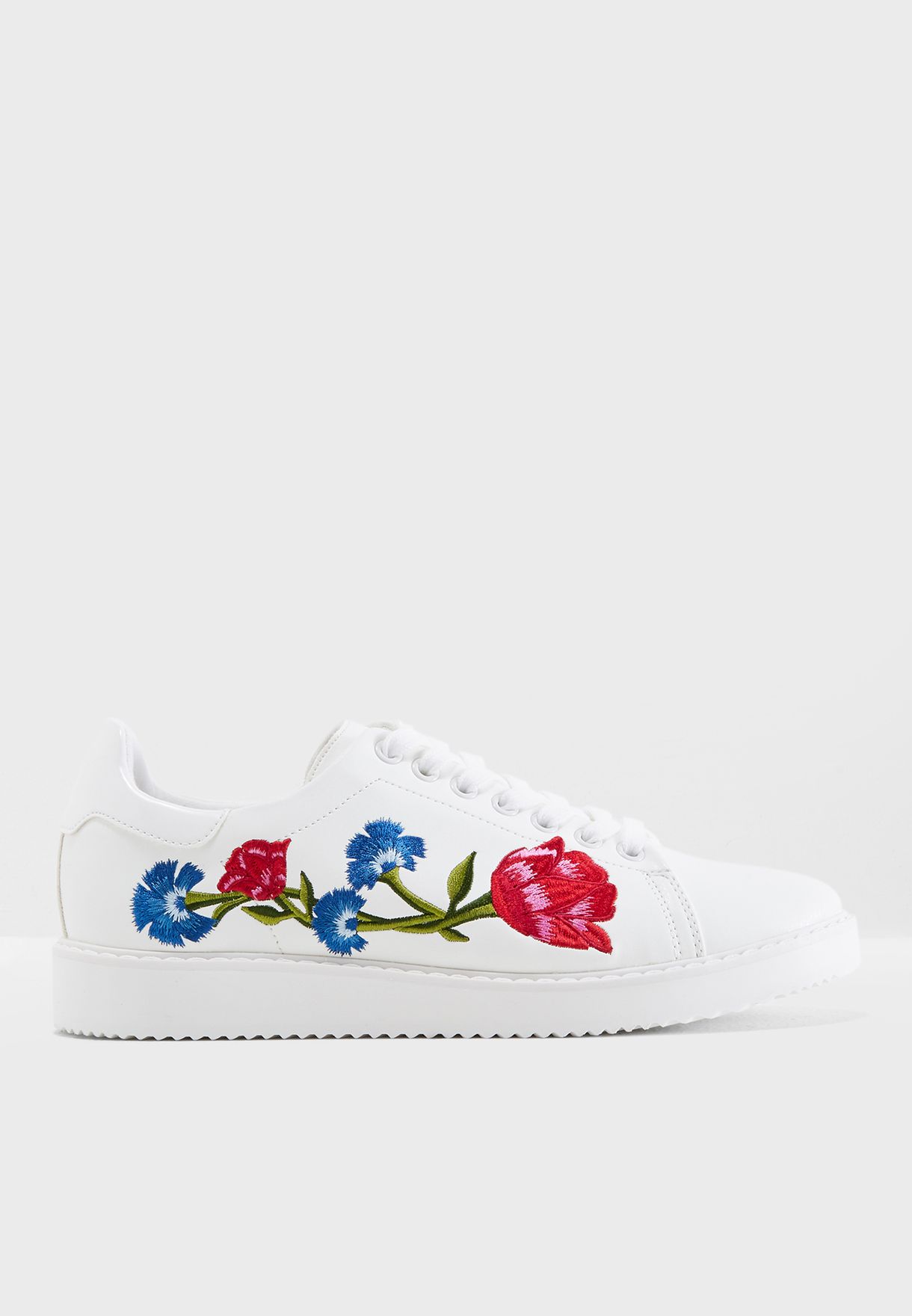 white embroidered sneakers