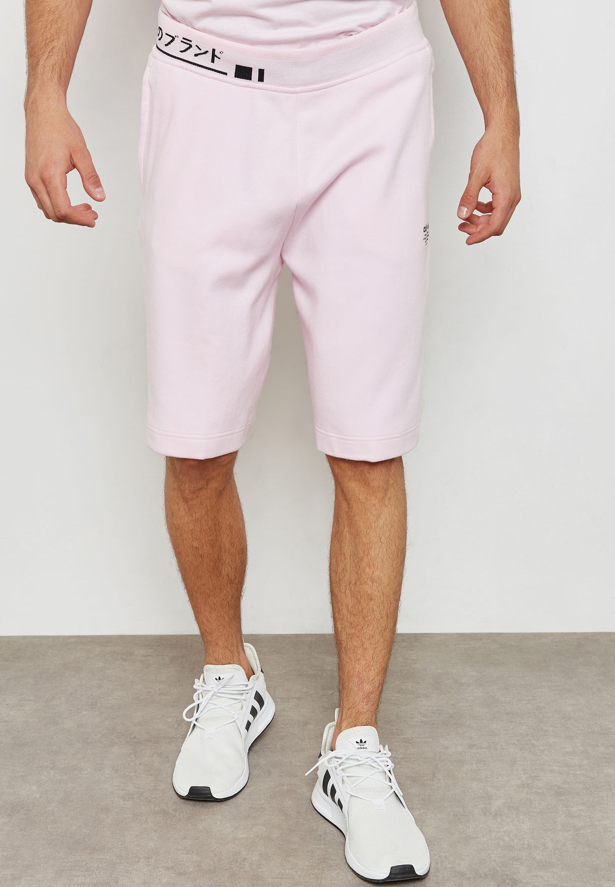 Buy adidas Originals pink NMD Shorts 