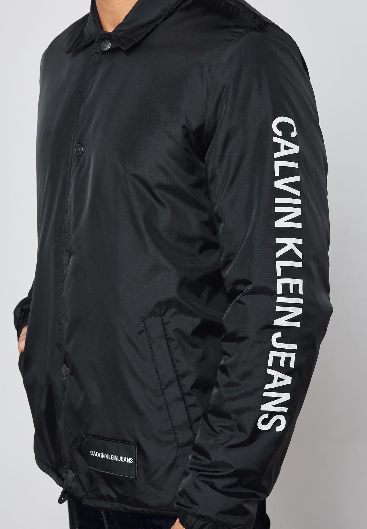 calvin klein institutional logo coach jacket