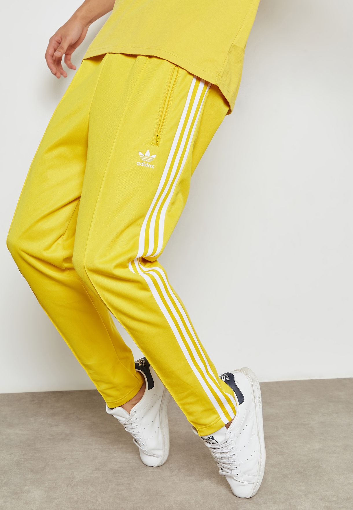 yellow adidas jogging pants