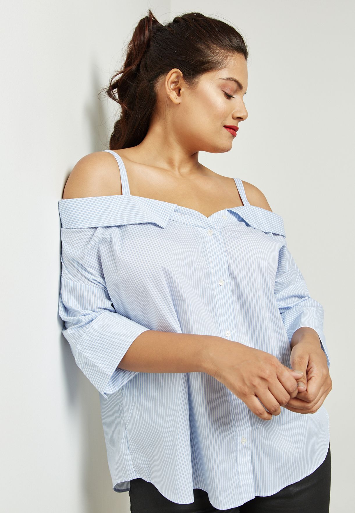 blue and white striped cold shoulder top