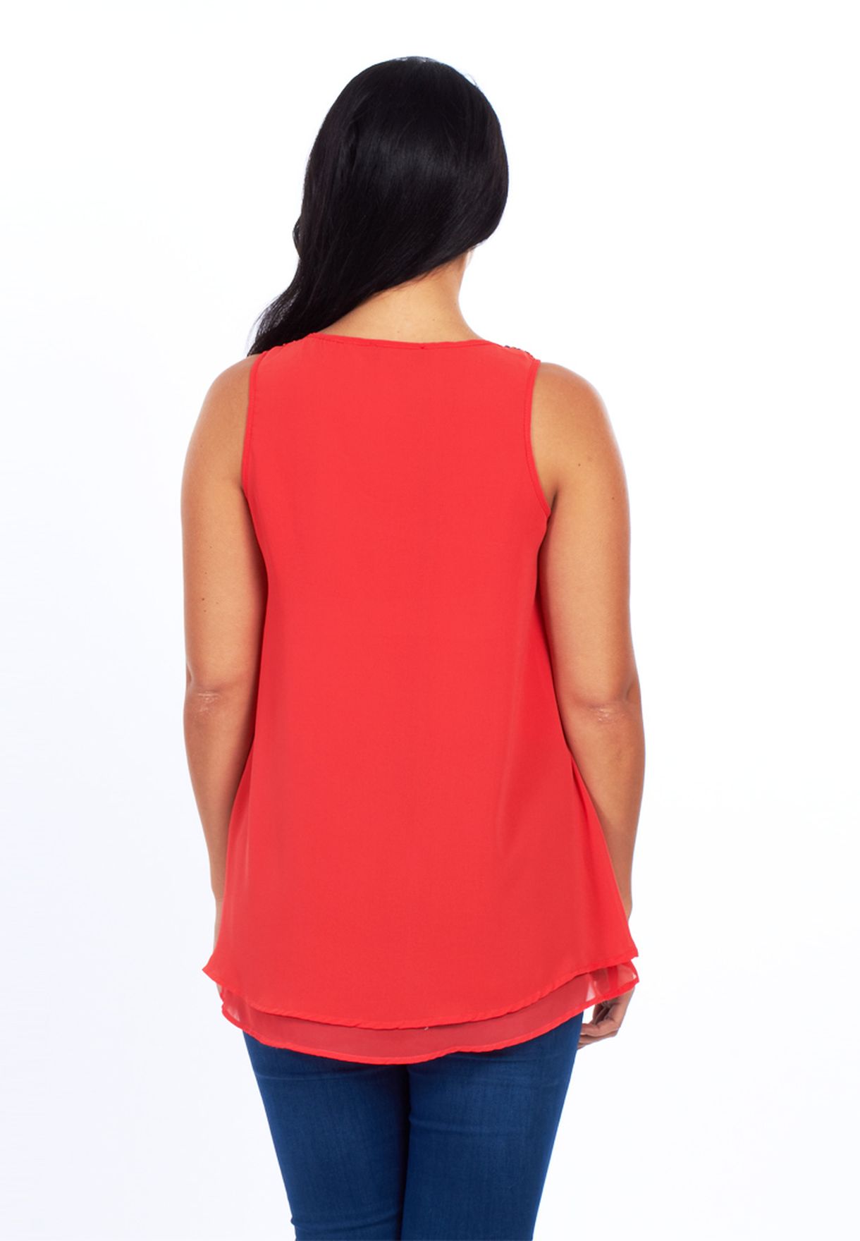 red sleeveless tunic