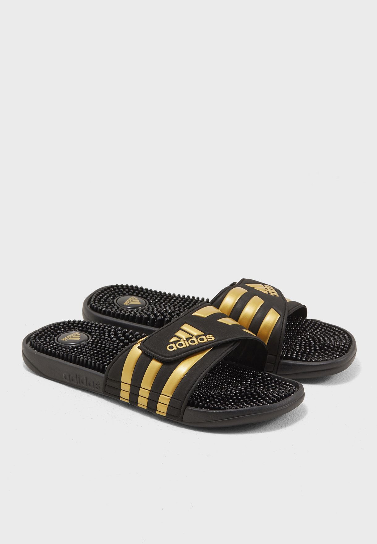 adidas slippers black and gold