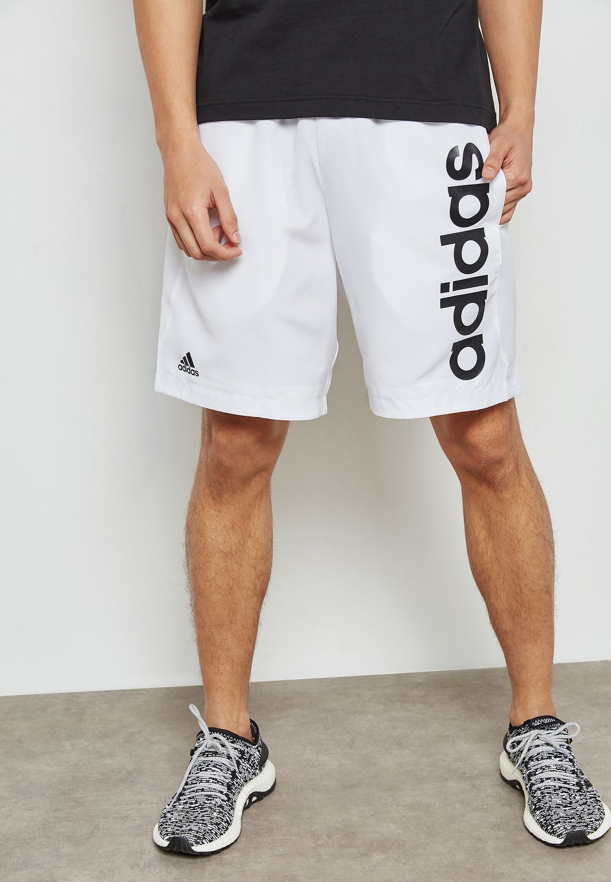 Buy adidas white Essential Linear Chelsea Shorts for Men in MENA, Worldwide