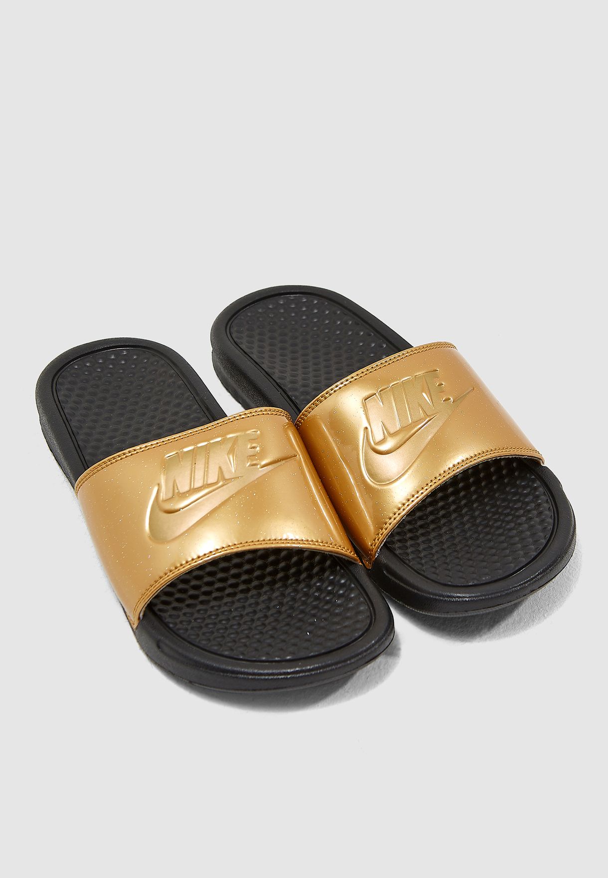 Buy Nike gold Benassi JDI Print Slides 