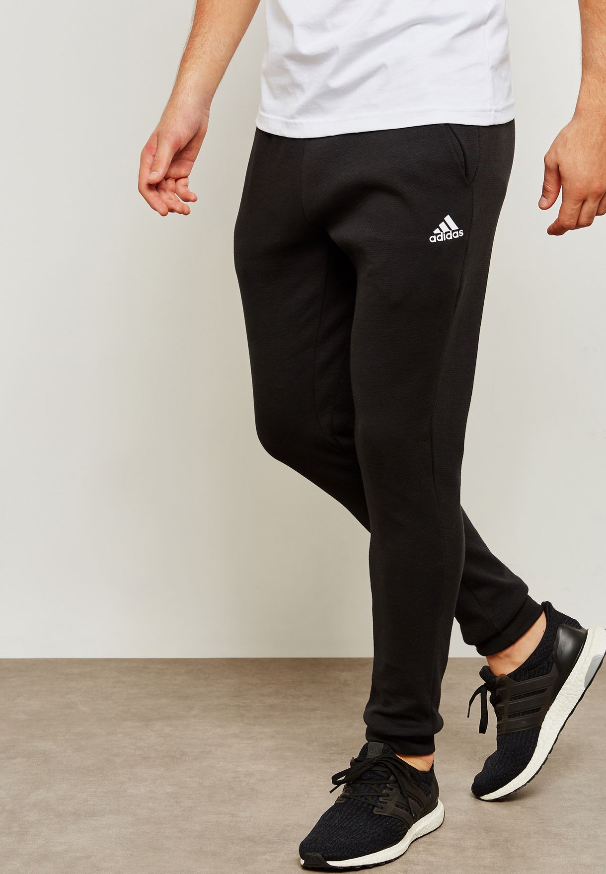 Buy adidas black ID Champ Sweatpants 