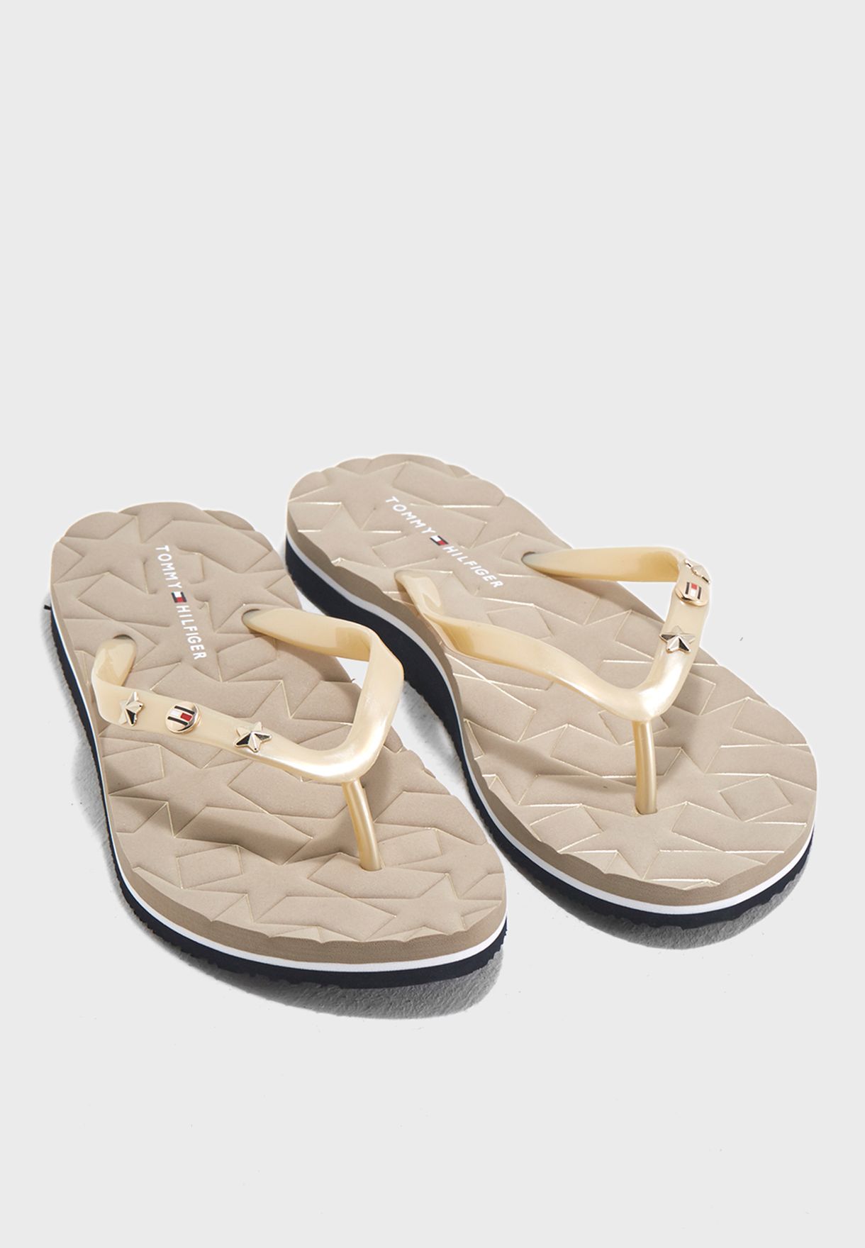 tommy hilfiger gold flip flops