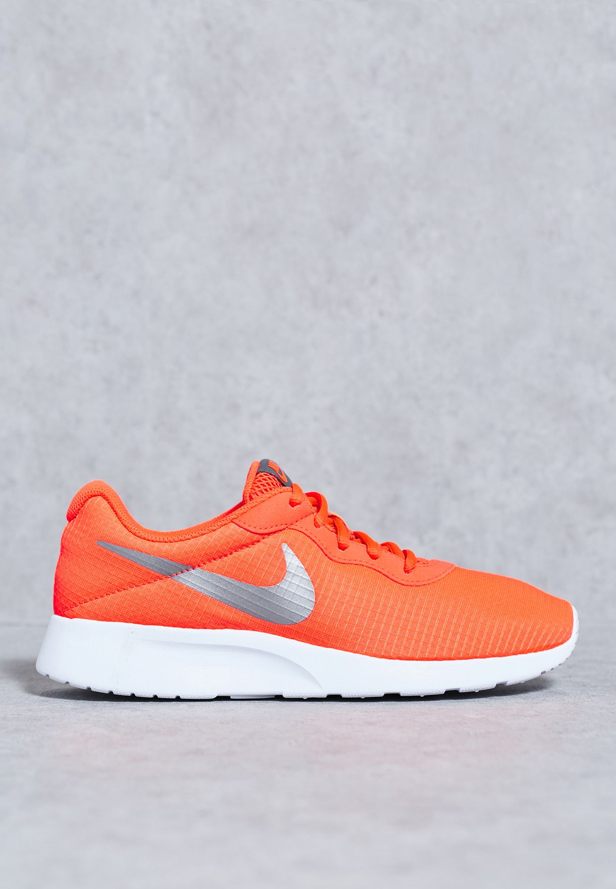 Buy Nike orange Tanjun SE for Women in 