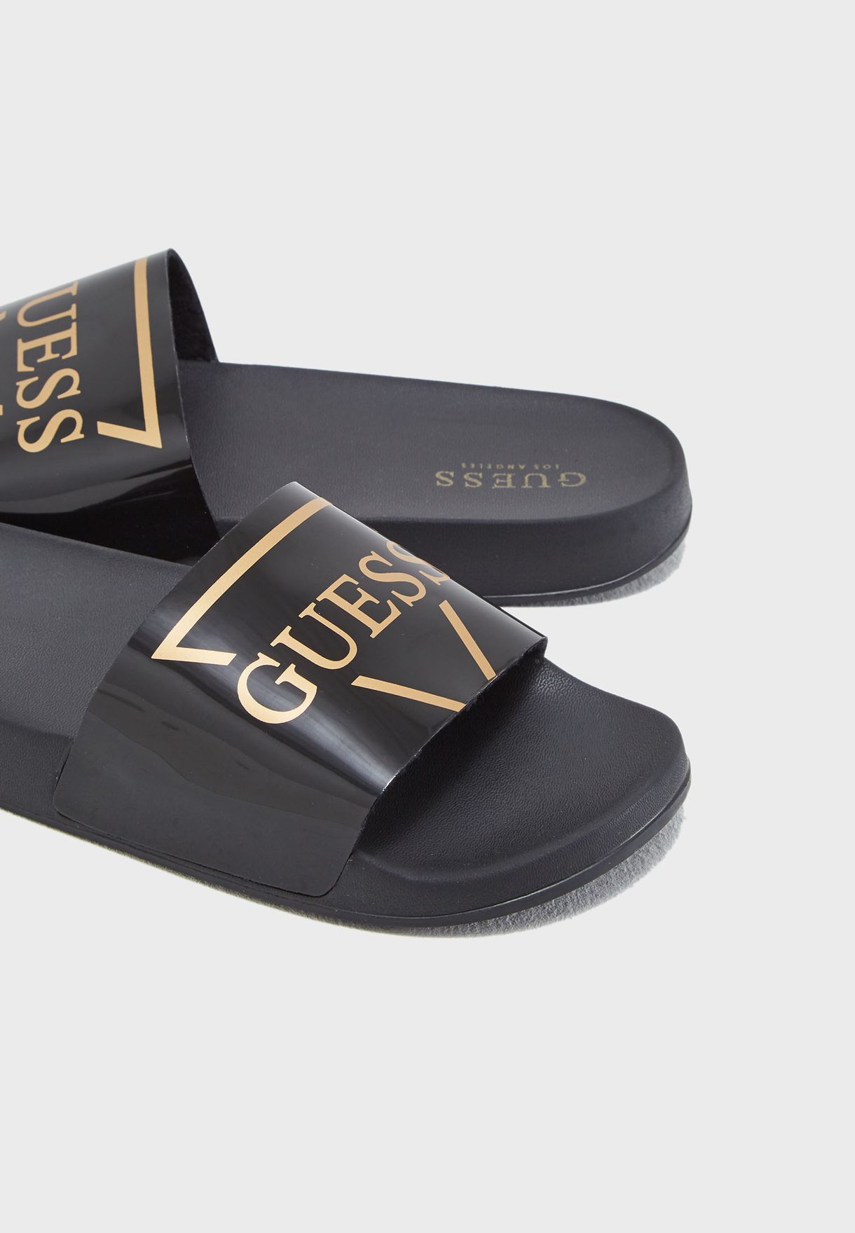 black and gold guess slides