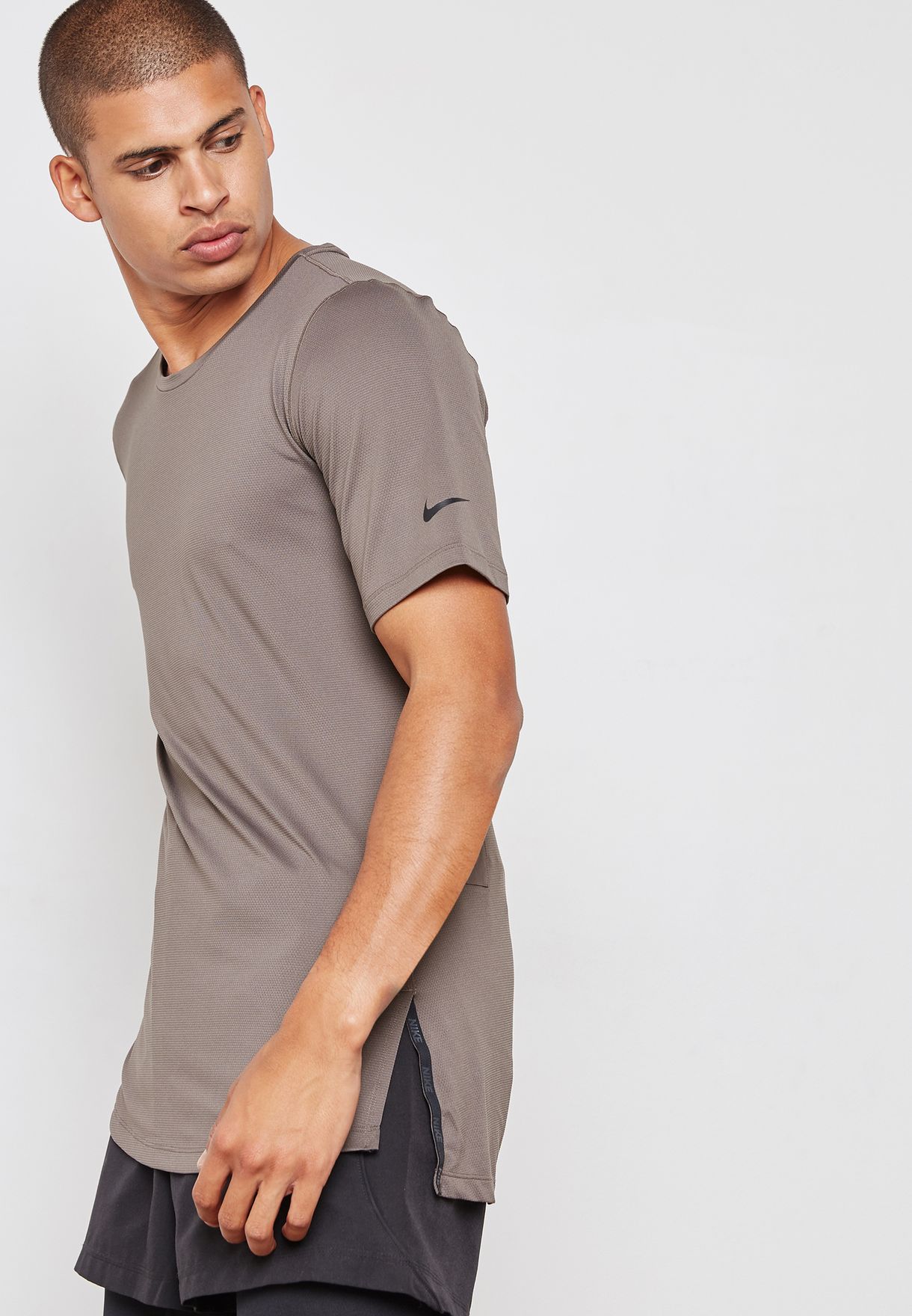 Buy Nike brown Utility T-Shirt for Men 