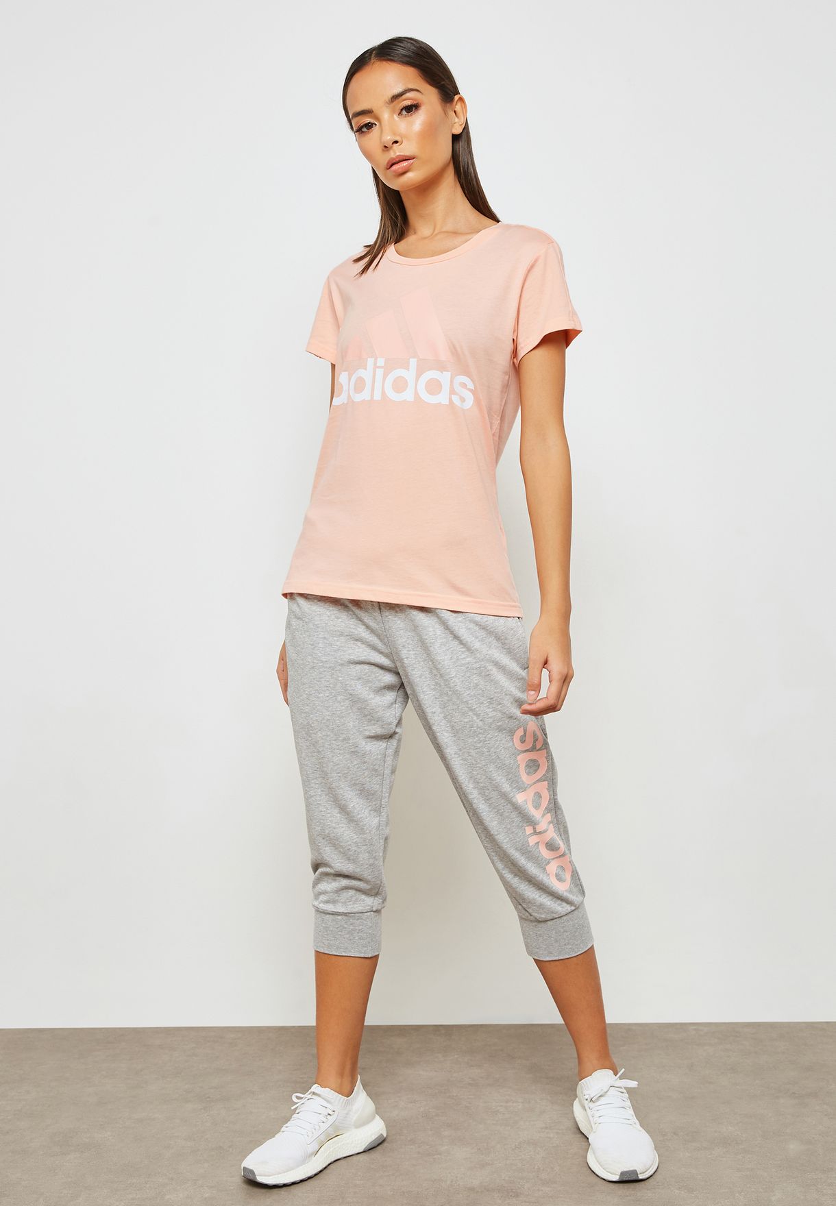 Buy adidas pink Essential Linear Slim T 