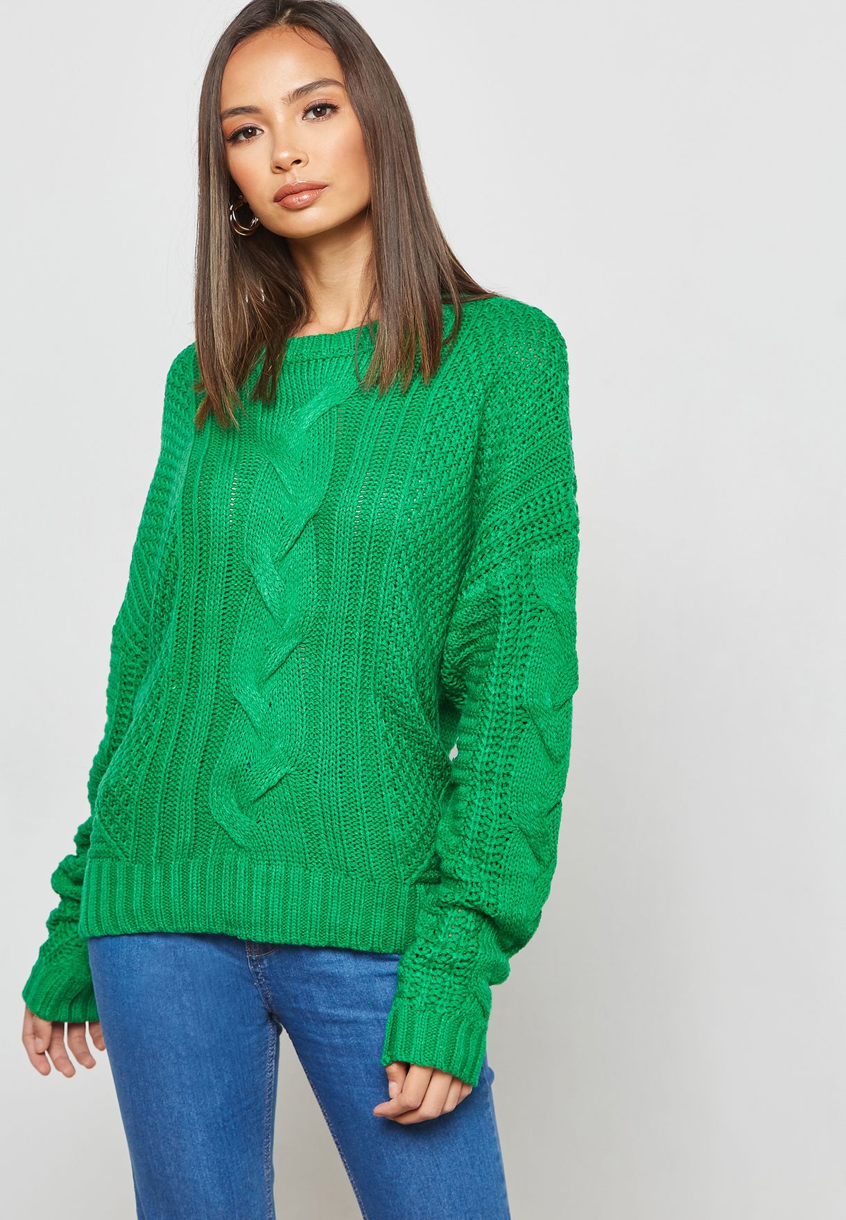 green cable knit sweater