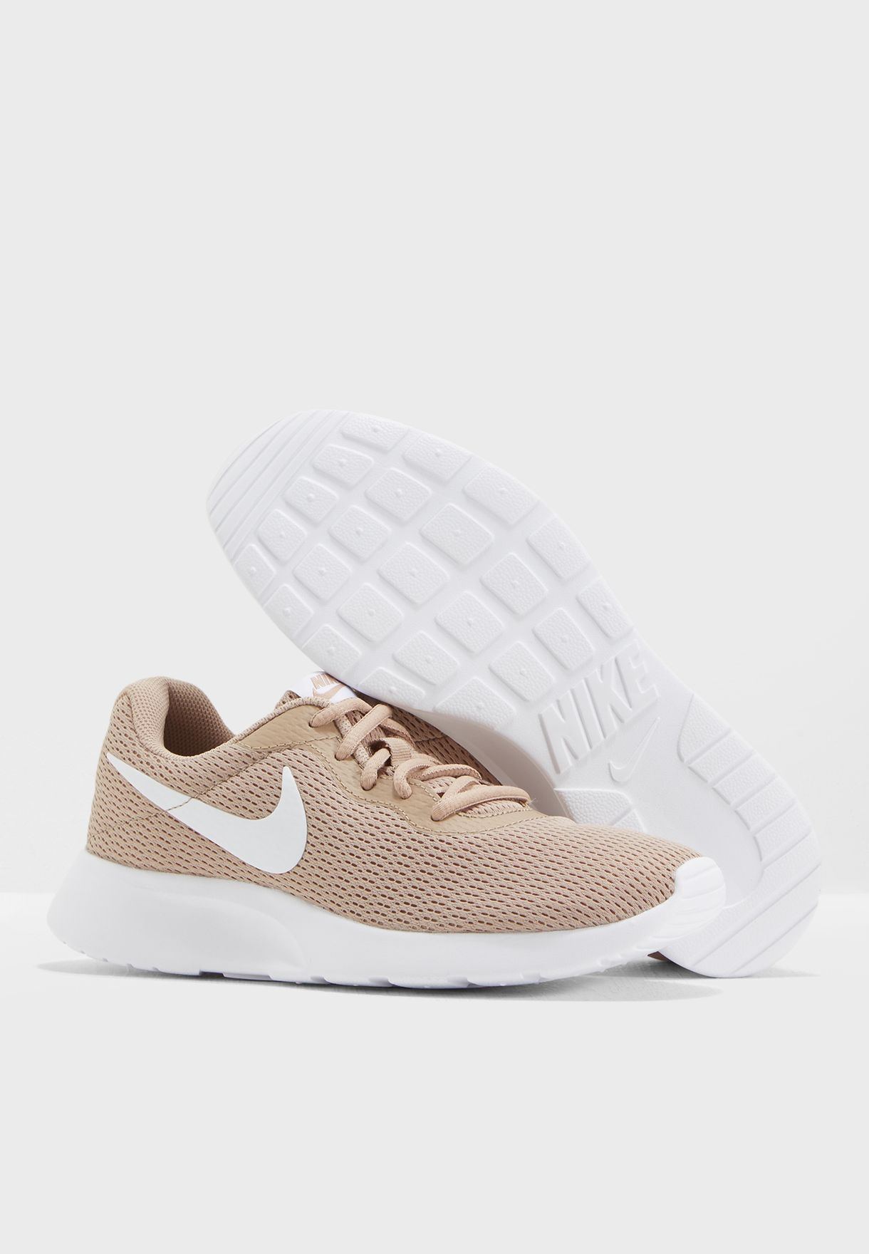 brown nike tanjun