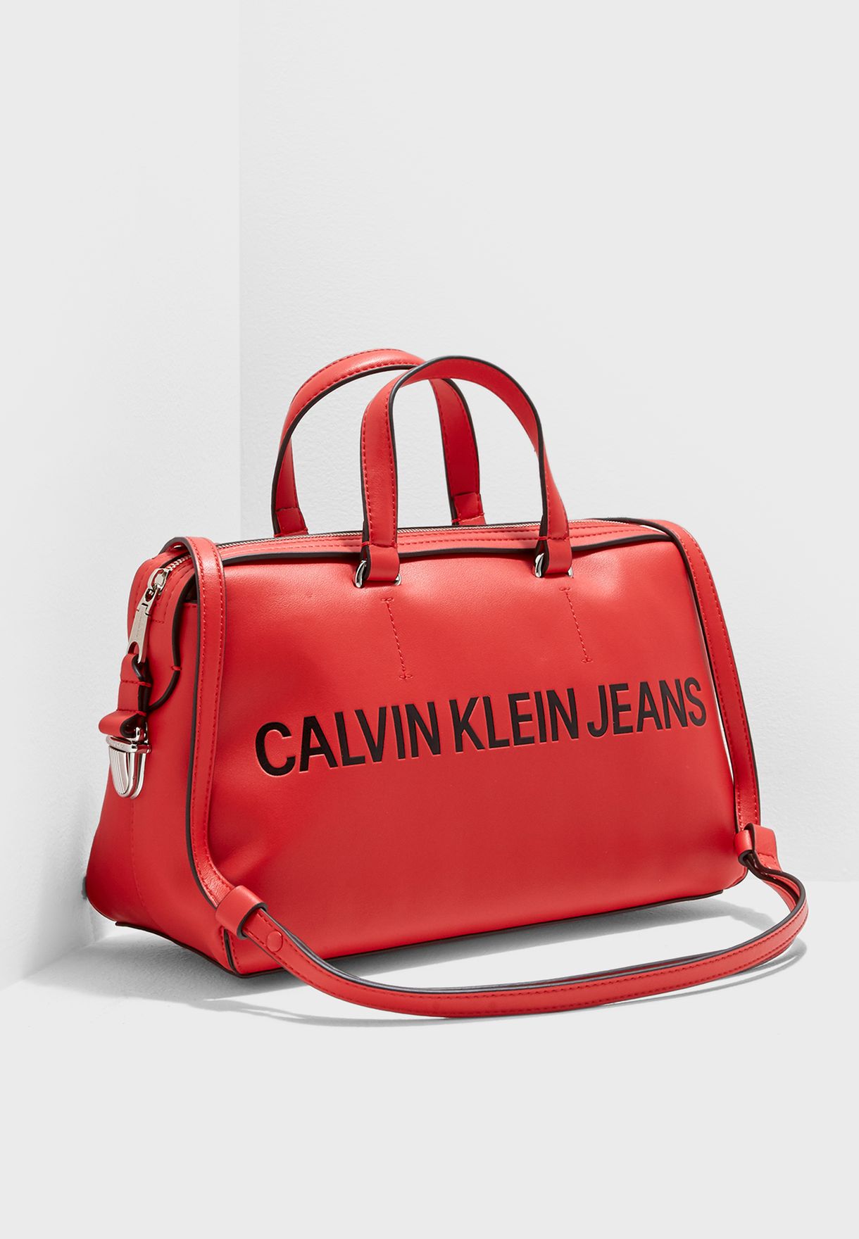 Buy Calvin Klein Jeans red Sculpted Barrel Duffel Bag for Women in Riyadh,  Jeddah