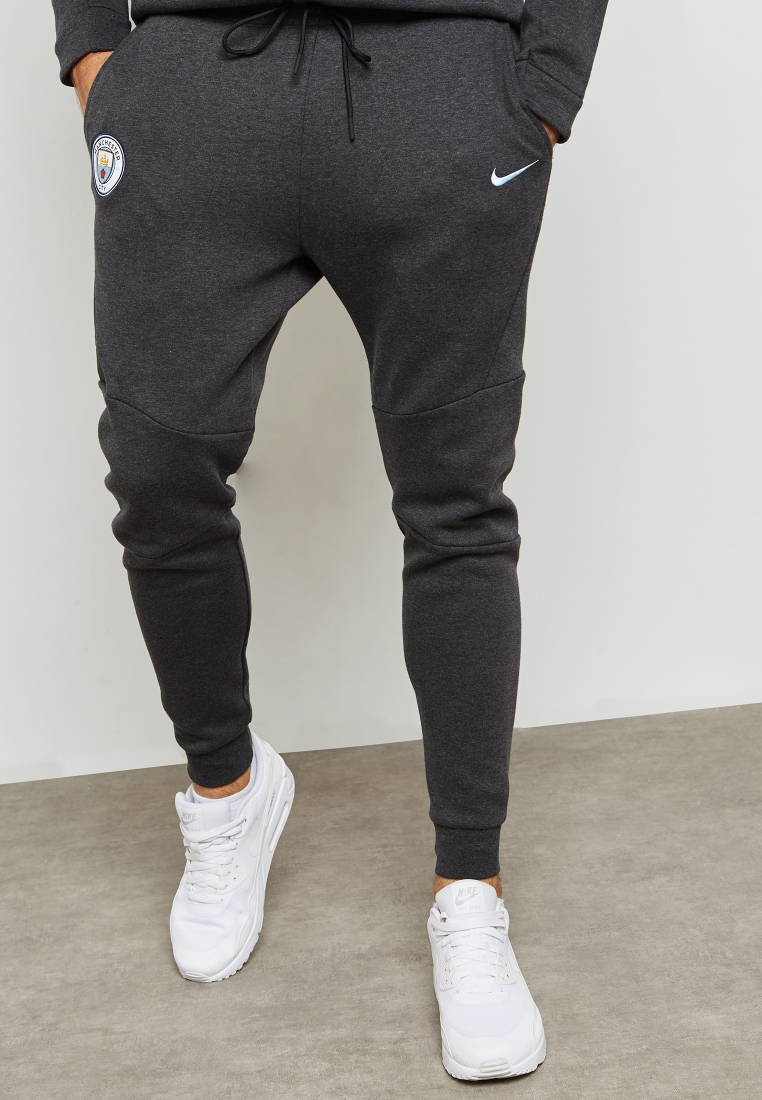 schouder Vervreemden Stroomopwaarts Buy Nike grey Manchester City Tech Fleece Sweatpants for Men in MENA,  Worldwide